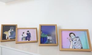 移民管理警察把戍边故事绘成漫画送战友