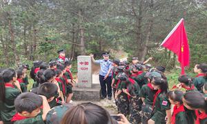 描红界碑共铸国防梦 携手少先队员共赴边关行