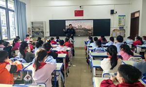 移民管理警察进校园 公祭日前播撒和平种子