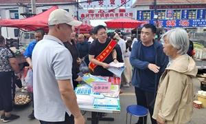 政法委搭台法治大集 群众热情高涨积极参与